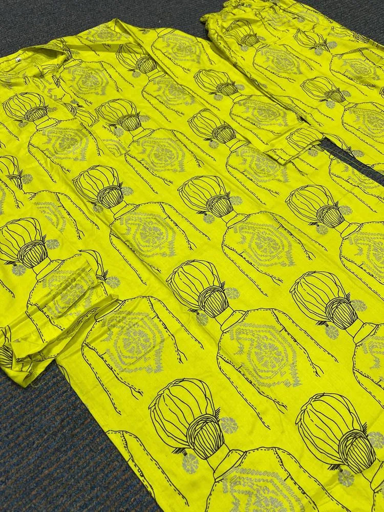 Yellow fabric with black floral pattern on a textured surface