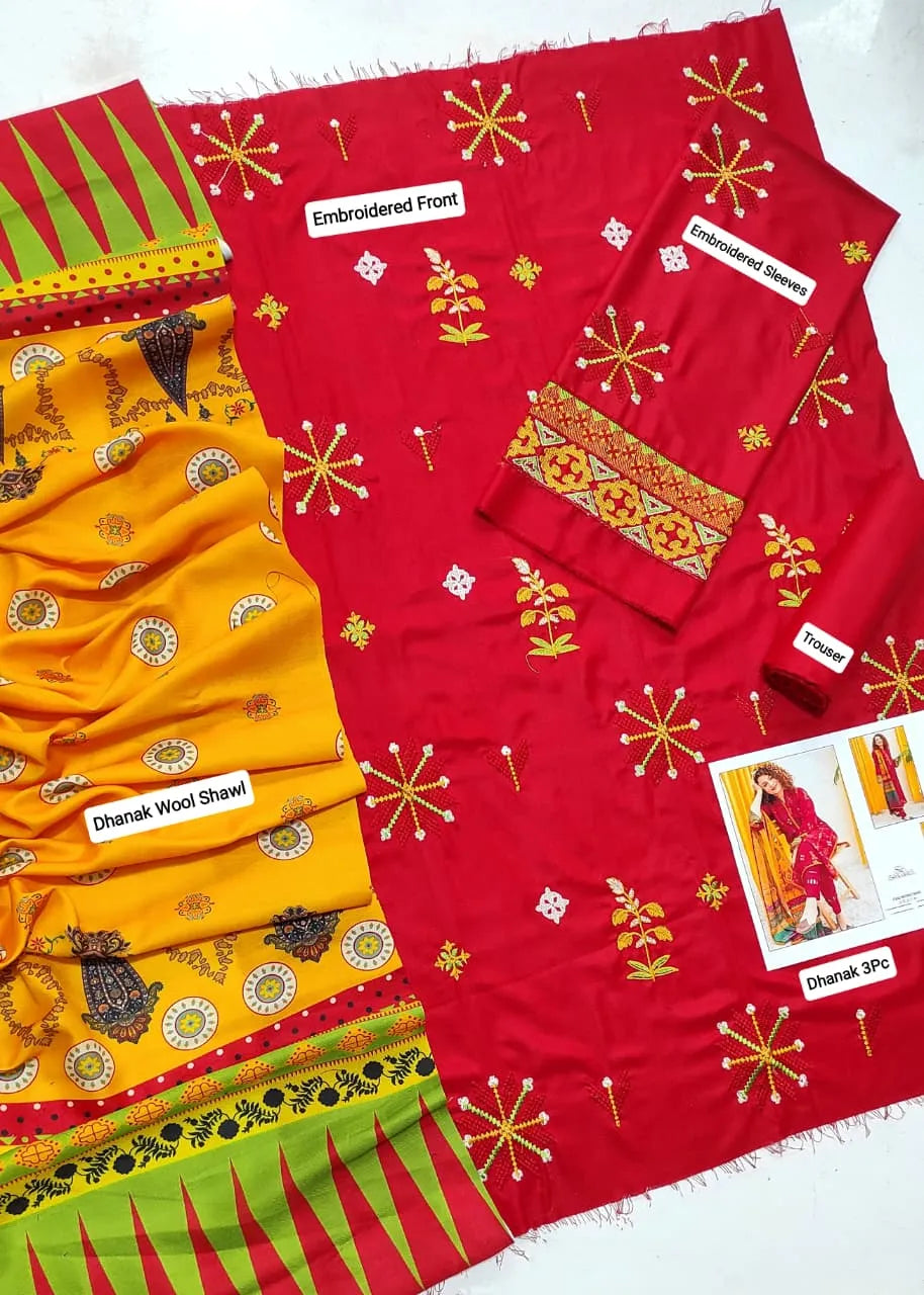 Red and yellow fabric with embroidery patterns on a white background